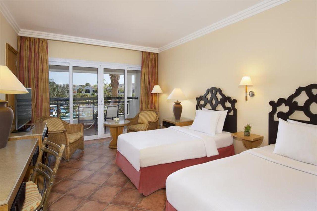 Sharm Dreams Vacation Club - Aqua Park Otel Dış mekan fotoğraf A room at the Hilton Luxor