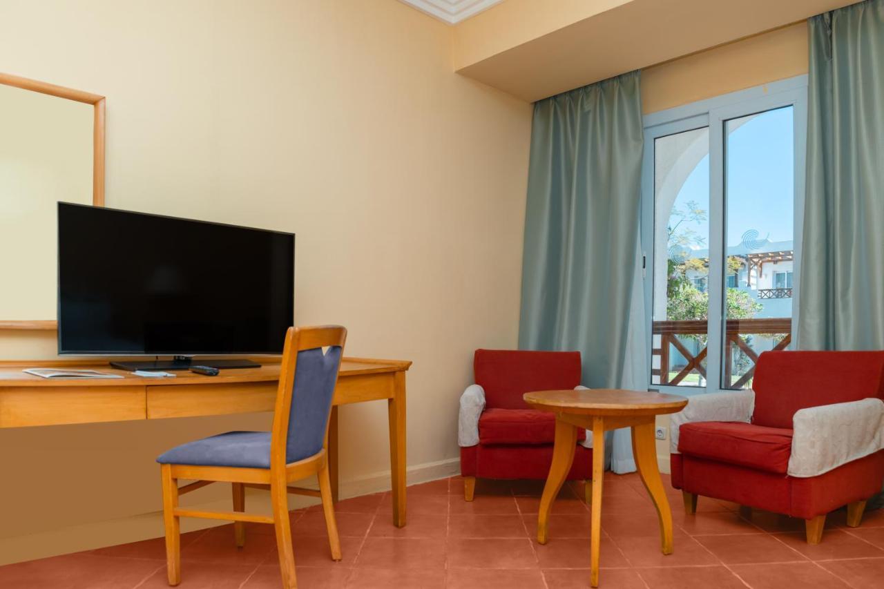 Sharm Dreams Vacation Club - Aqua Park Otel Dış mekan fotoğraf A room at the hotel