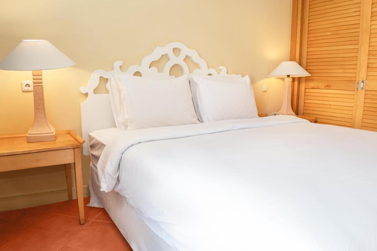 Sharm Dreams Vacation Club - Aqua Park Otel Dış mekan fotoğraf A bed
