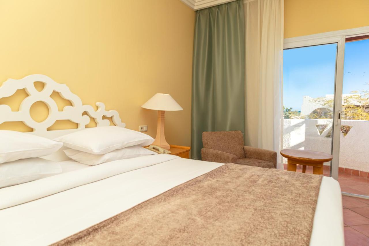 Sharm Dreams Vacation Club - Aqua Park Otel Dış mekan fotoğraf A bedroom at the hotel